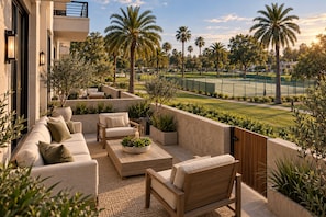 An outdoor patio with seating, planters, and a tennis court in the background. - Spacious & Modern 2 Bed / 1 Bath Suite Ideal Parkside Living! perfect new home (San Diego)