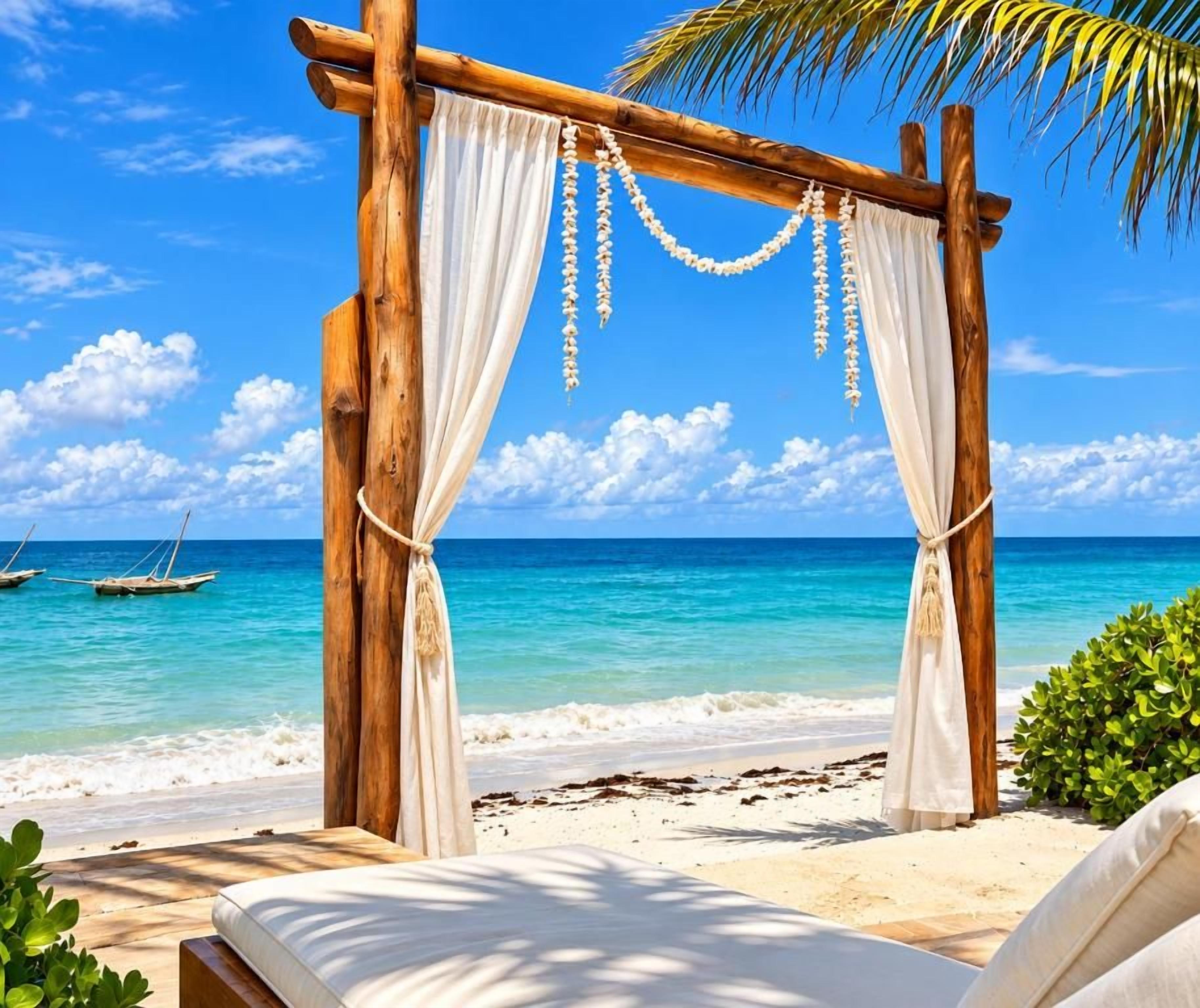 Una cabaña de playa de madera con cortinas blancas y adornos colgantes, con vista a una playa y aguas turquesas cristalinas, y un barco a lo lejos.