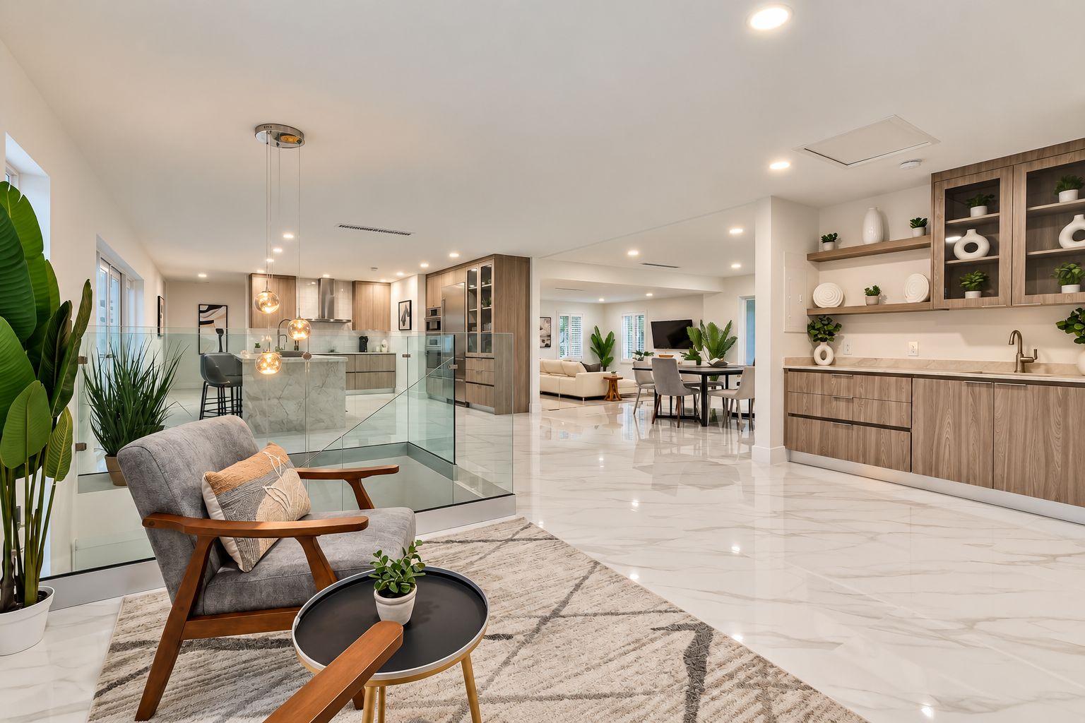 A modern interior with a dining area, kitchen, and living space.