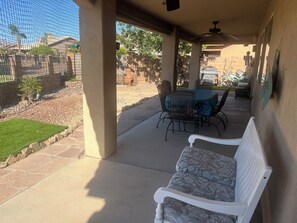 Outdoor dining - Tropical oasis on golf course located on quiet cul de sac in Mesa Del Sol. (Yuma)