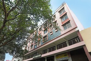 A multi-story building with a sign for 'Variety Business Plaza'.