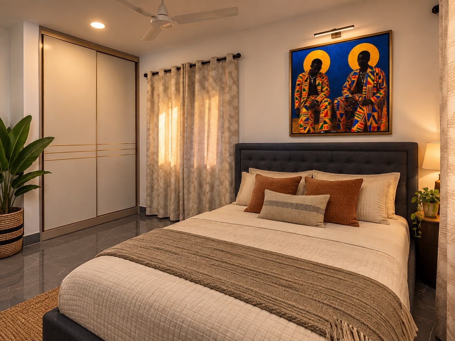 A bedroom with a large bed, a ceiling fan, a painting on the wall, and a window with curtains.