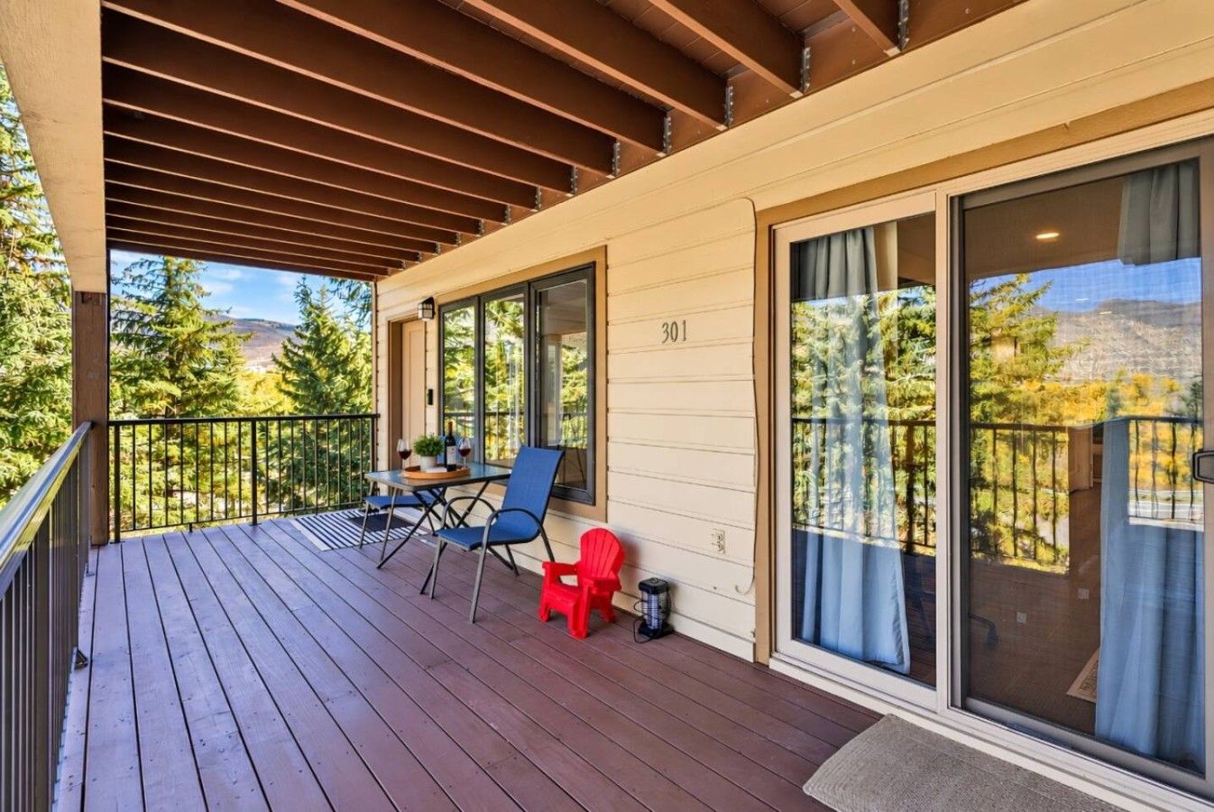 Spacious covered deck with outdoor seating