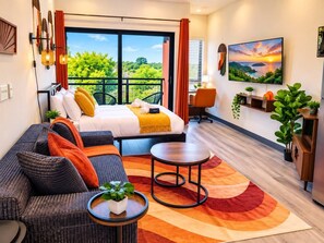 A modern hotel room with a bed, sofa, and a dining area. - *New* Suite Perfect DT Location I Gym and Rooftop (Atlanta)