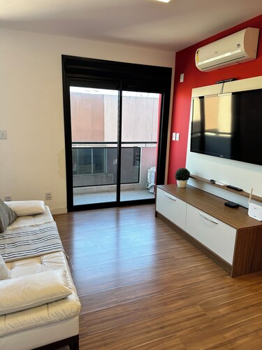 Fully furnished loft with king-size bed.