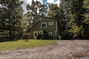 A two-story house with a front porch, surrounded by trees. - Hot Tub Sauna Fire Pit 20 Min to Asheville (Fairview)