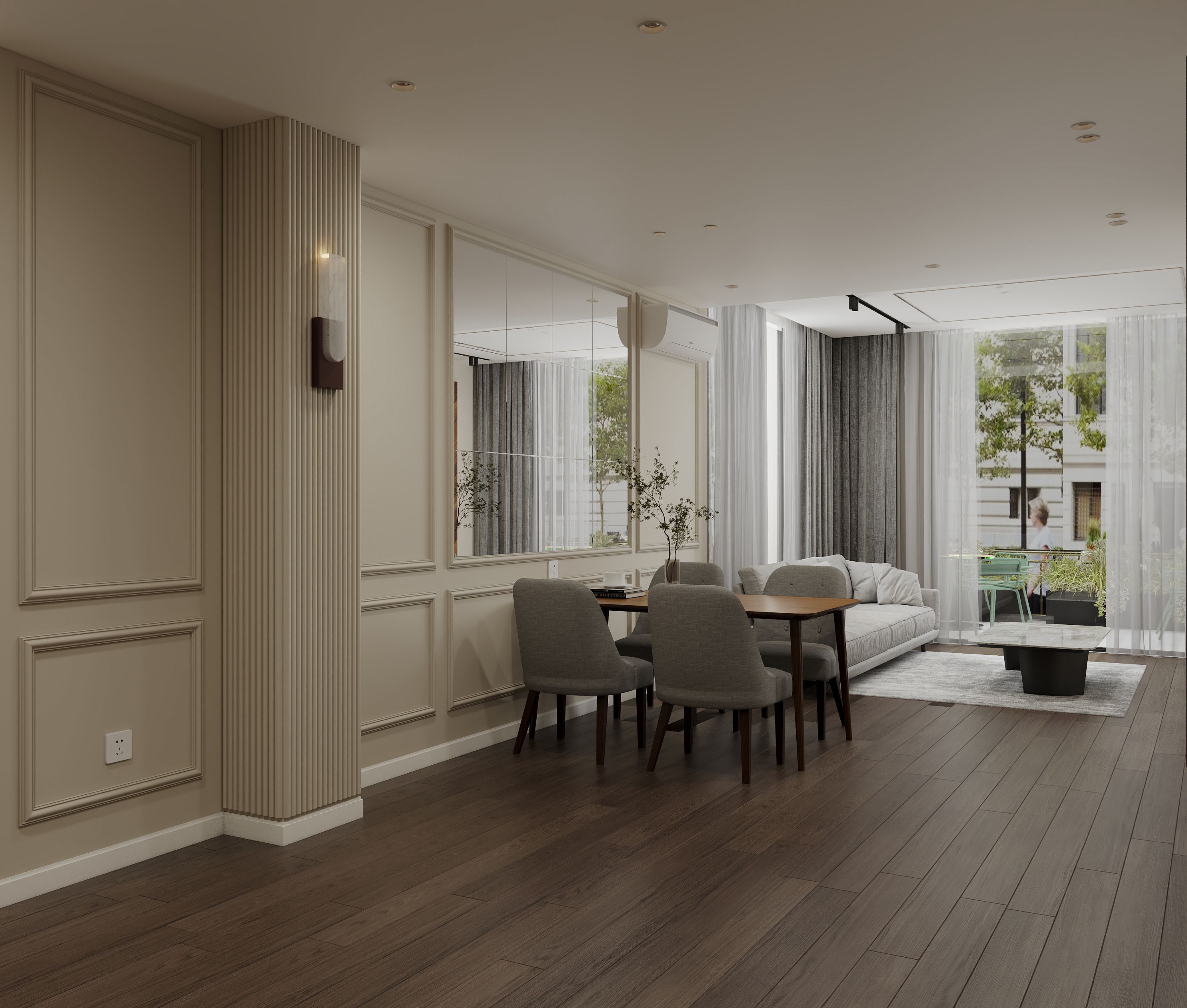 Un interior moderno con comedor, sofá y vistas al exterior.