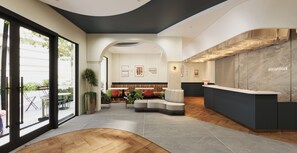 A modern reception area with a curved reception desk, seating area with sofas, and a large window providing a view of the outdoors. - LOUIS MO Signature (Ngu Hanh Son)