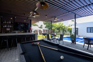 A pool table with a bar area and outdoor seating. - 2 adjoining country homes with 2 heated pools, 2 terraces, and a garden (Jardines de la calera)
