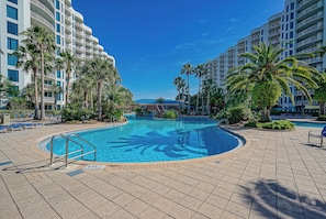 Dive into fun at the resort’s large swimming pool​ - Poolside Paradise Resort Pool (Destin)