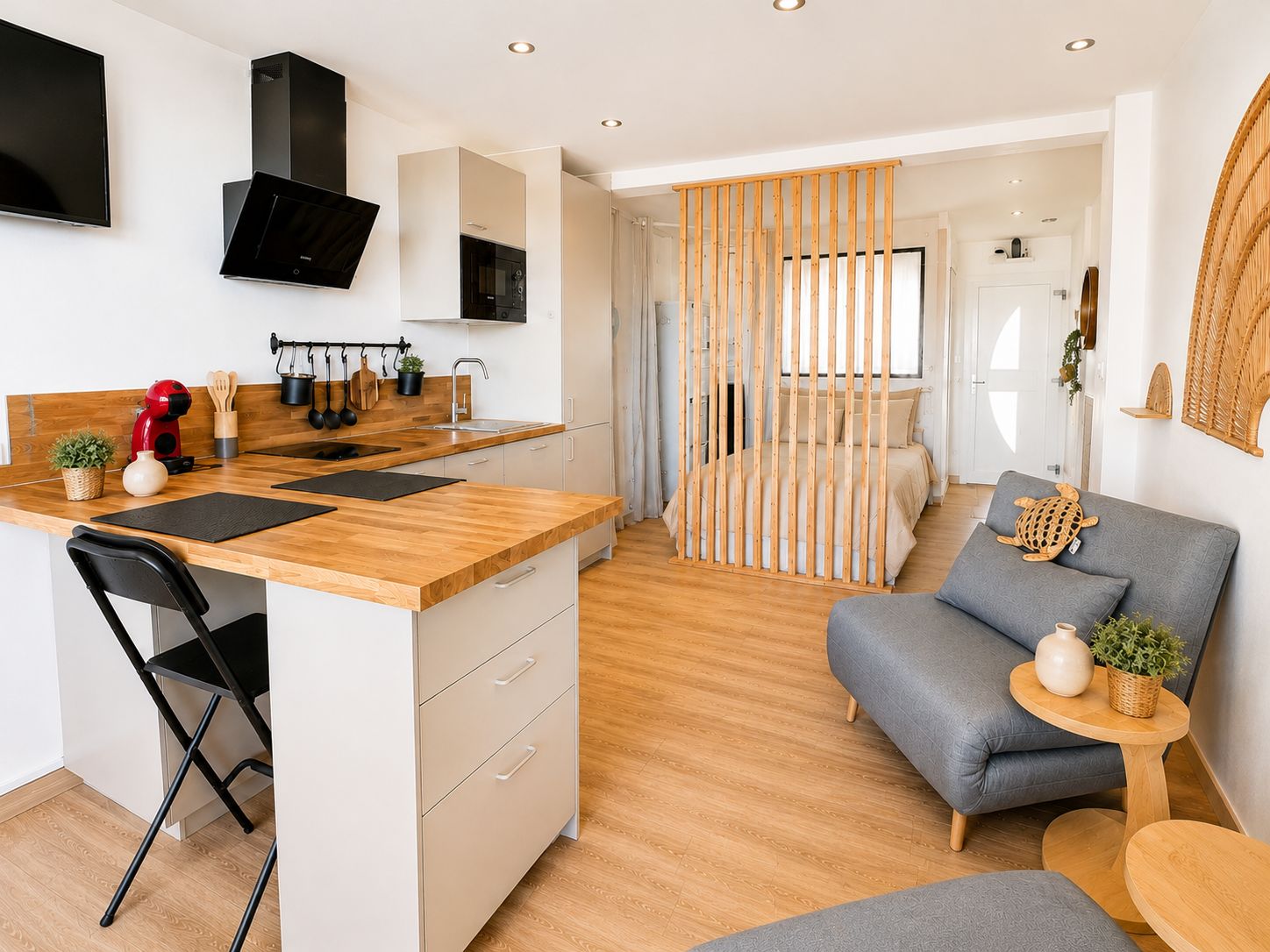 A modern apartment with a kitchen, dining area, and living room.