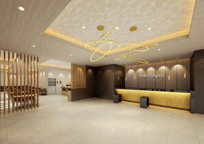A hotel reception area with a modern design, featuring a reception desk, seating area, and a decorative ceiling light fixture. - SmileHotelPremium Tottori (Minami-Yoshikata, Tottori-shi, Tottori)