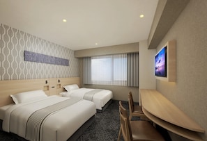 A hotel room with two beds, a TV, and a seating area. - SmileHotelPremium Tottori (Minami-Yoshikata, Tottori-shi, Tottori)