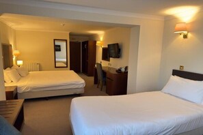 A hotel room with two beds, a desk, a chair, a television, and a mirror. - Keavil House Hotel Dunfermline by Sunday - Executive family room (Dunfermline)