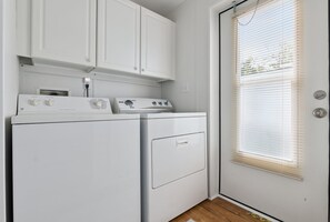 Indoor laundry.  Detergent provided for your stay. First aid & fire extinguisher - Chubby Mermaid! NEW!  Private Covered Dock & Saltwater Canal / Small Dogs ok. (Edgewater)