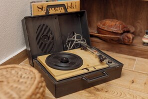 A vintage record player in a wooden case with a label that reads 'Stavros'. - Lake House Sreten (Šavnik)