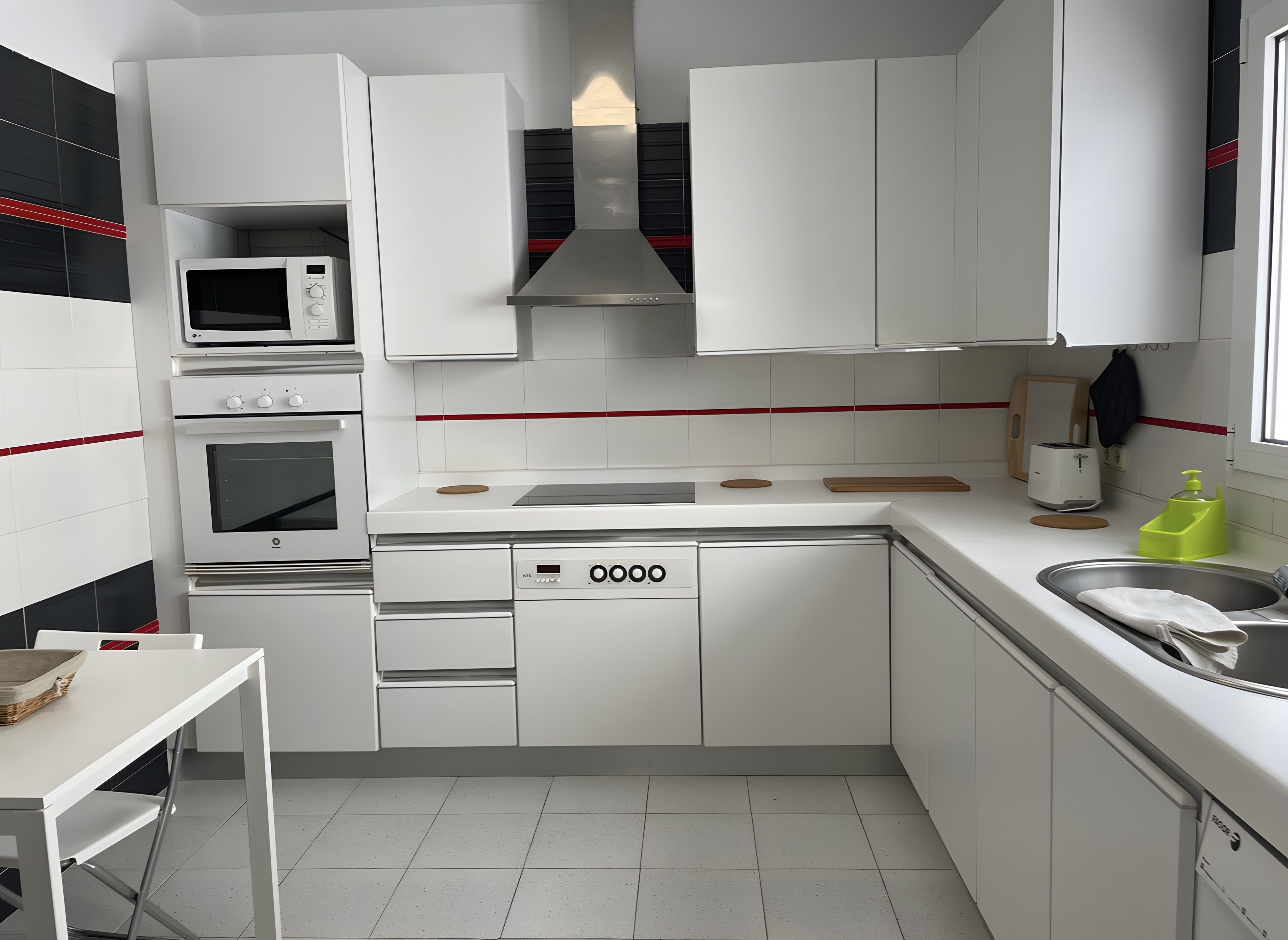 A modern kitchen with white cabinetry, a built-in microwave, a stove, and a dishwasher.