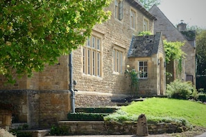 Grand stone entrance to the main house, tucked away in a peaceful village lane - Cotswold Cottage, Inglenook Fire & Sun-Trap Courtyard | Dog Friendly | Pub Walk (Cherington)