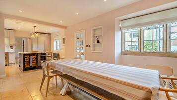 Dining room with long table for group meals