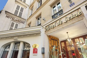 Hotel de Seine with a classic facade, a prominent entrance, and a visible address number. - Elegant Saint-Germain Retreat with Parisian Charm in the Heart of Paris (Paris)