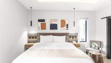 Ein modernes Hotelzimmer mit einem großen Bett, Nachttischen, einem Sessel und Kunstwerken an der Wand.