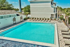 A rectangular swimming pool with a 3.5 ft depth marking, surrounded by lounge chairs and a building with a balcony. - 🌊Walk to Beach-Great Location-4BR Pet Friendly Beachwaves Driftwood🌊 (Miramar Beach)