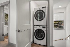 Enjoy the convenience of your own in-unit washer and dryer, tucked neatly into a dedicated alcove for easy access during your stay. - Charming Riverfront Property Close to the Resort! Pet Friendly! (Steamboat Springs)