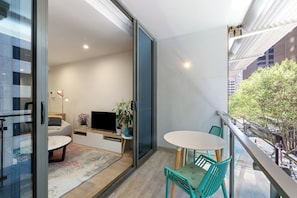 Take your morning coffee or an easy meal outside, where a table for two overlooks the leafy city streetscape. - The Midtown Studio Sydneys Magic All Around You (Sydney)