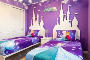 A bedroom with two beds, purple walls, and a Frozen-themed decor. - 5BR Themed Home w/ Pool Windsor Island (Davenport)