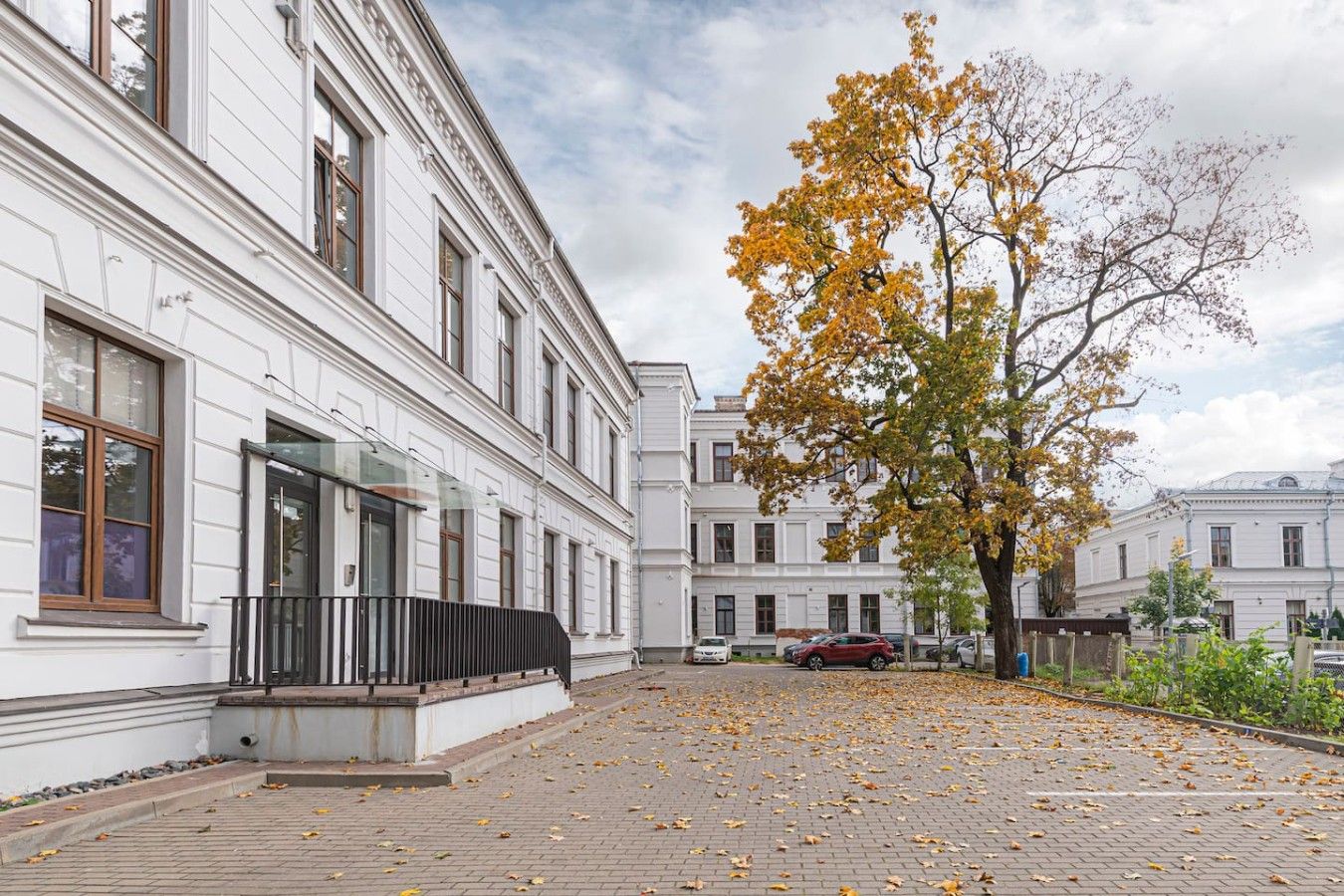 A building with a classical architectural style, featuring symmetrical windows and a central entrance.