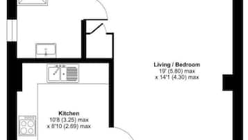 A floor plan with a garden room, kitchen, and living/bedroom.