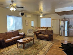 Living area - Gorgeous 1-Bedroom Lakeside Cabin w/AC, Pellet Stove & Private Fenced Acre (Lakeside)