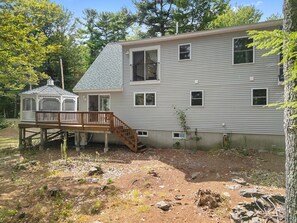 A two-story house with a deck and a small gazebo. - Laurel Shores 3br/3ba Oceanfront Harpswell Retreat w/ Deck (Harpswell)