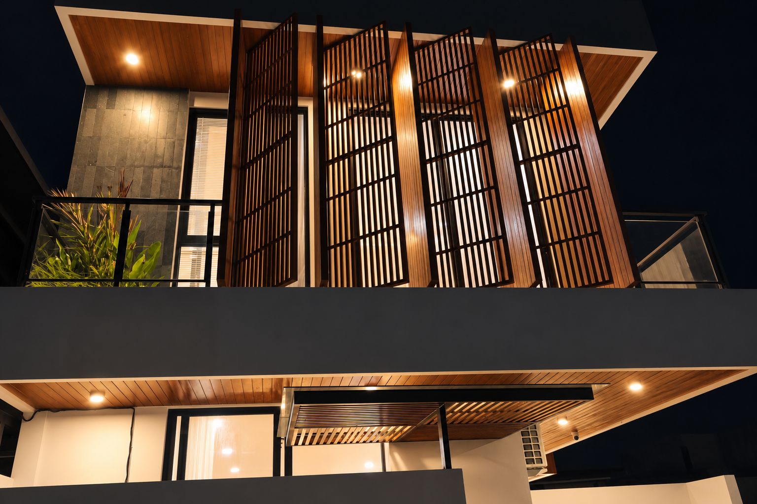 A modern building with a wooden facade, large windows, and a flat roof.