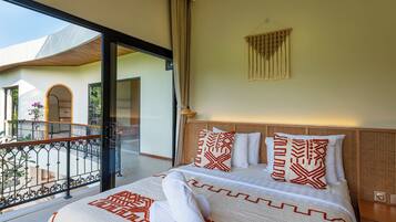 A hotel room with a bed, a balcony, and a view of the outside.