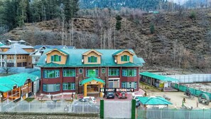 A multi-story building with a sign reading 'Hayat Residency.' - Hayat Residency pahalgam (Pahalgam)