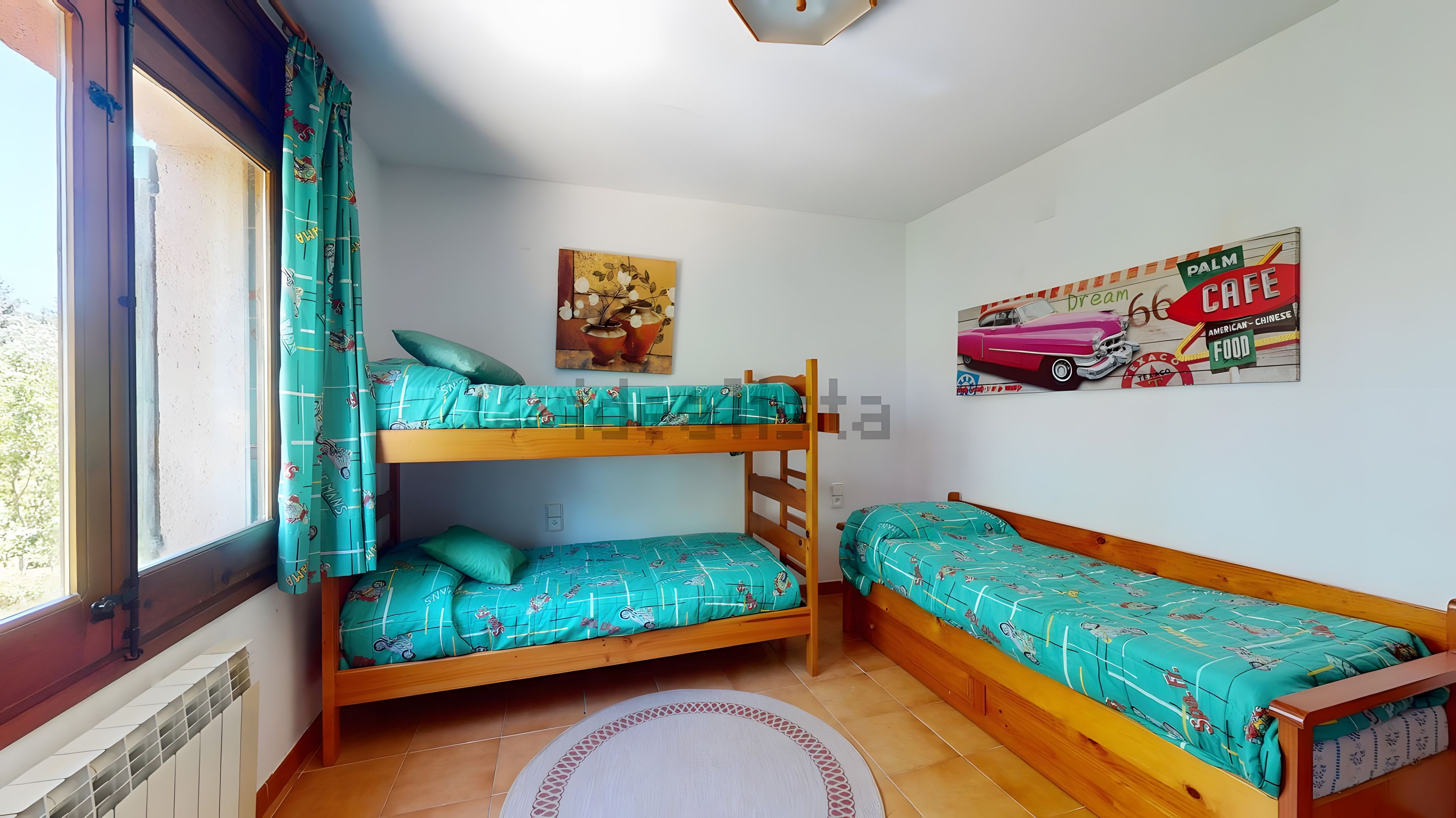 A room with two bunk beds, a radiator, a window with curtains, a wall with a poster, and a tiled floor.