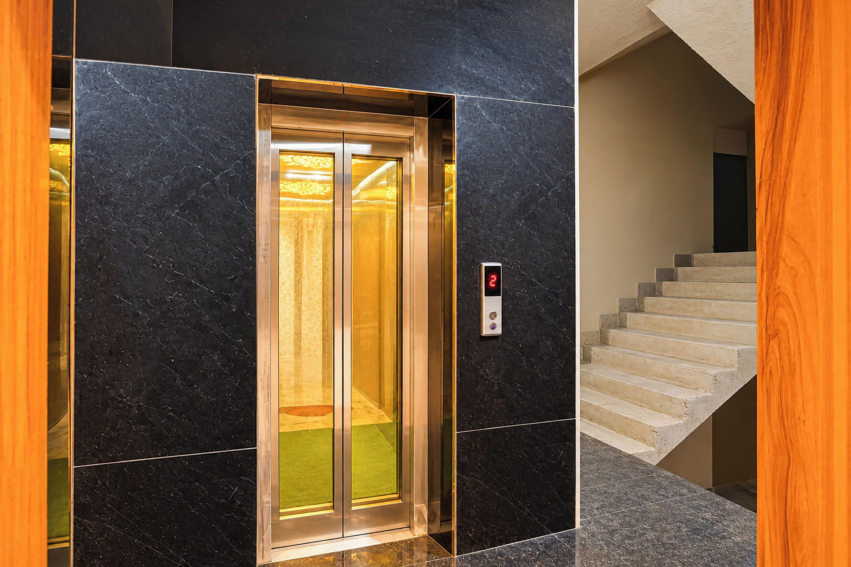 An elevator with a digital display indicating the floor number.