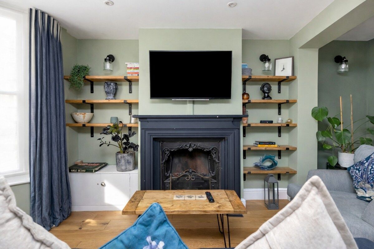 A cosy, well-equipped room with thick curtains for warmth and darkness, a feature fireplace as a focal point, and plenty of space for books and personal items. A TV with all channels and a coffee table for morning coffee or evening wine.