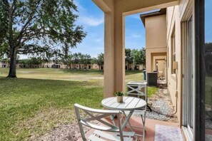 Outdoor dining - Regal Palms Villa | Lazy River | Slides | Arcade | (Davenport)