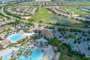 A resort with multiple swimming pools, golf courses, and residential buildings. - Relaxing Getaway | Private Pool & Spa (Kissimmee)