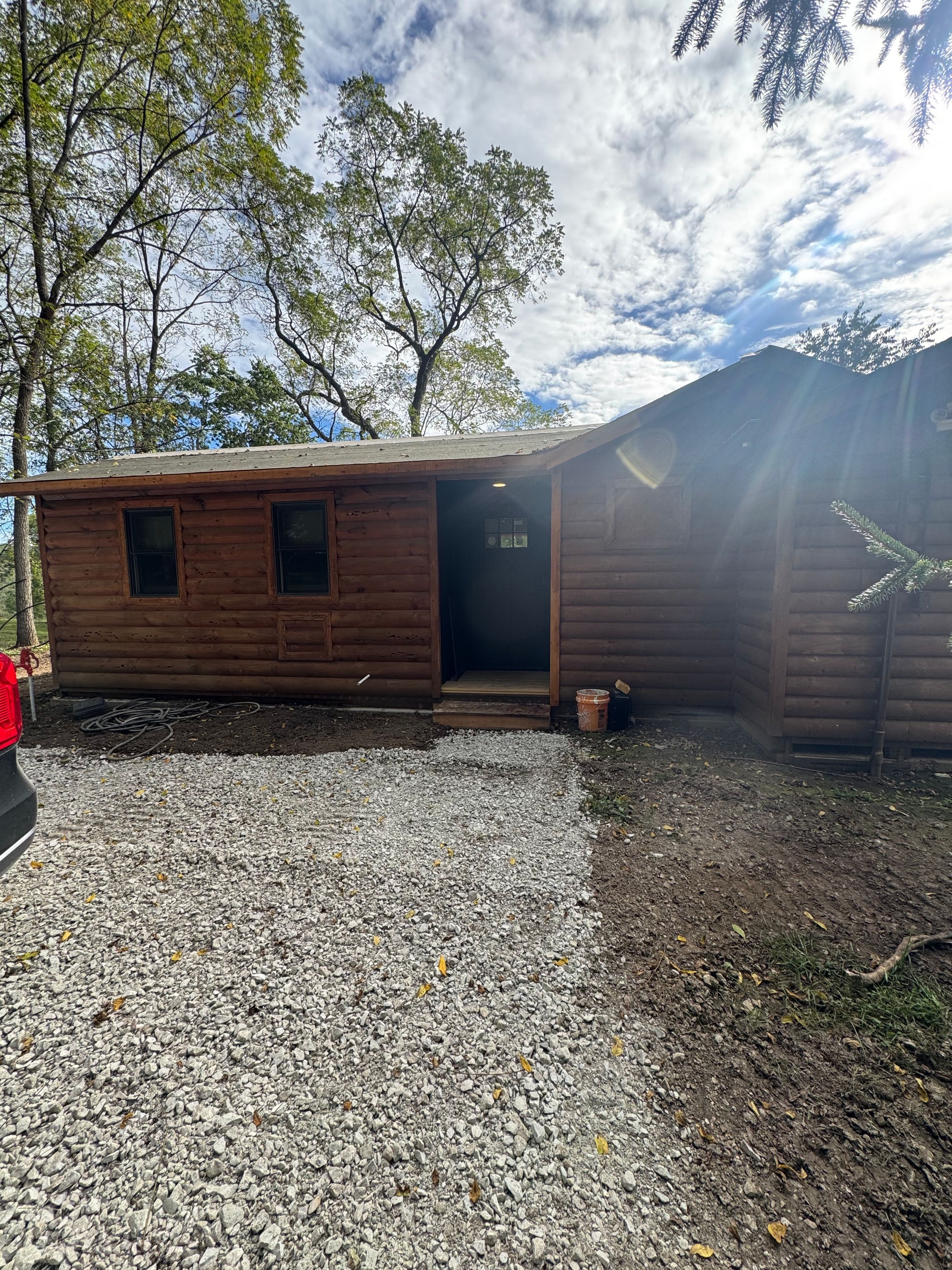 Rustic woodland cabin with private entry and easy gravel parking