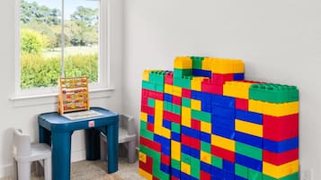Bright kids’ play nook with activity table and colorful building blocks