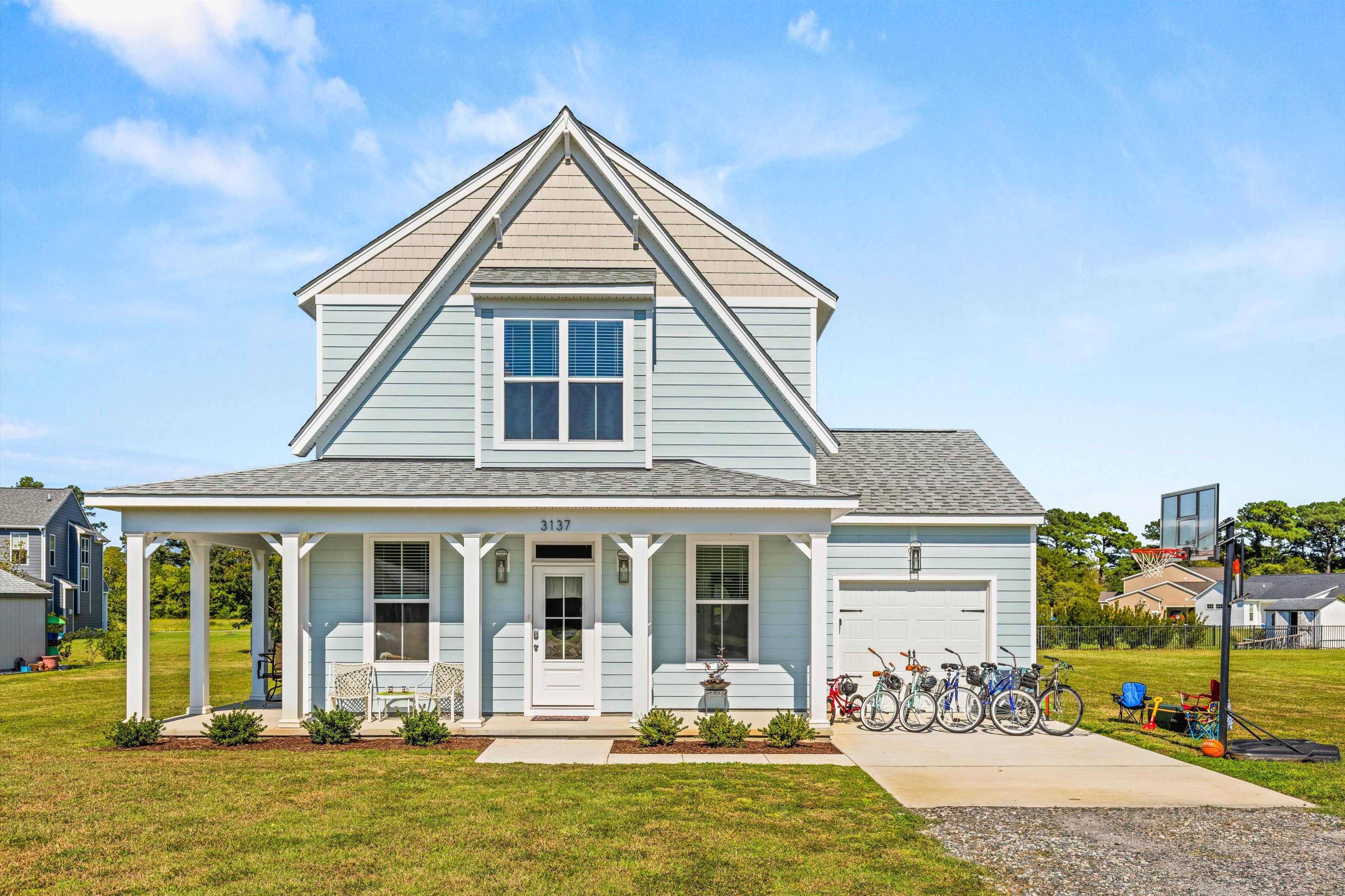 Charming coastal home with porch, bikes, and family-friendly outdoor fun
