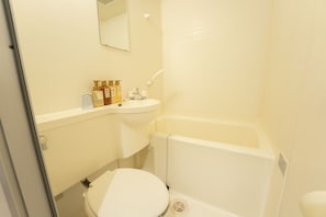 A bathroom with a toilet, sink, and bathtub. - OKU-AMAGASE ONSEN OHANA (Hita)