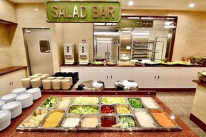 A salad bar with various food options and a sign indicating it's a salad bar. - Himeji Ekimae Universal Hotel Minamiguchi (Himeji)
