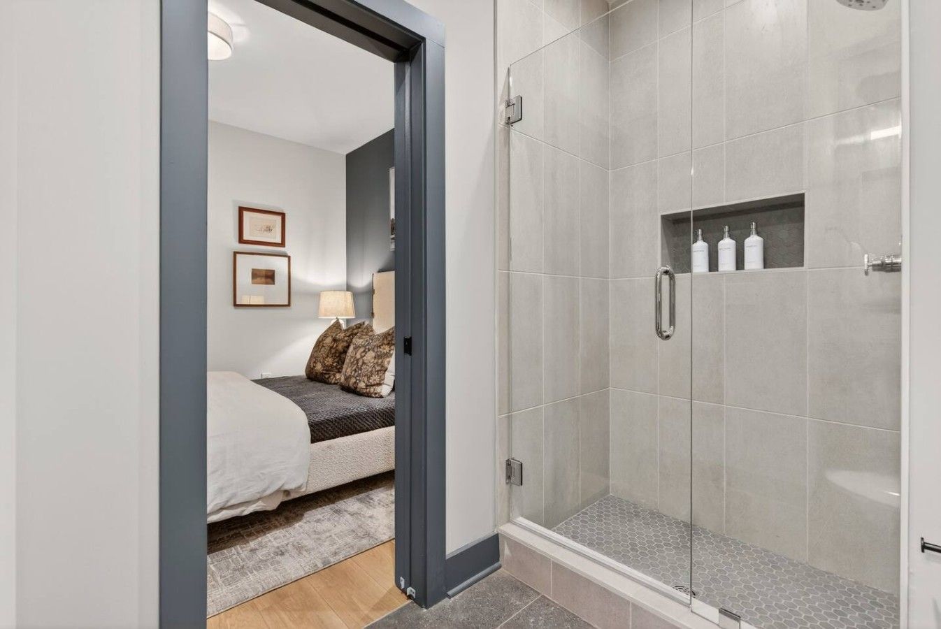 Private en-suite bathroom attached to Bedroom 1, featuring a spacious walk-in shower.