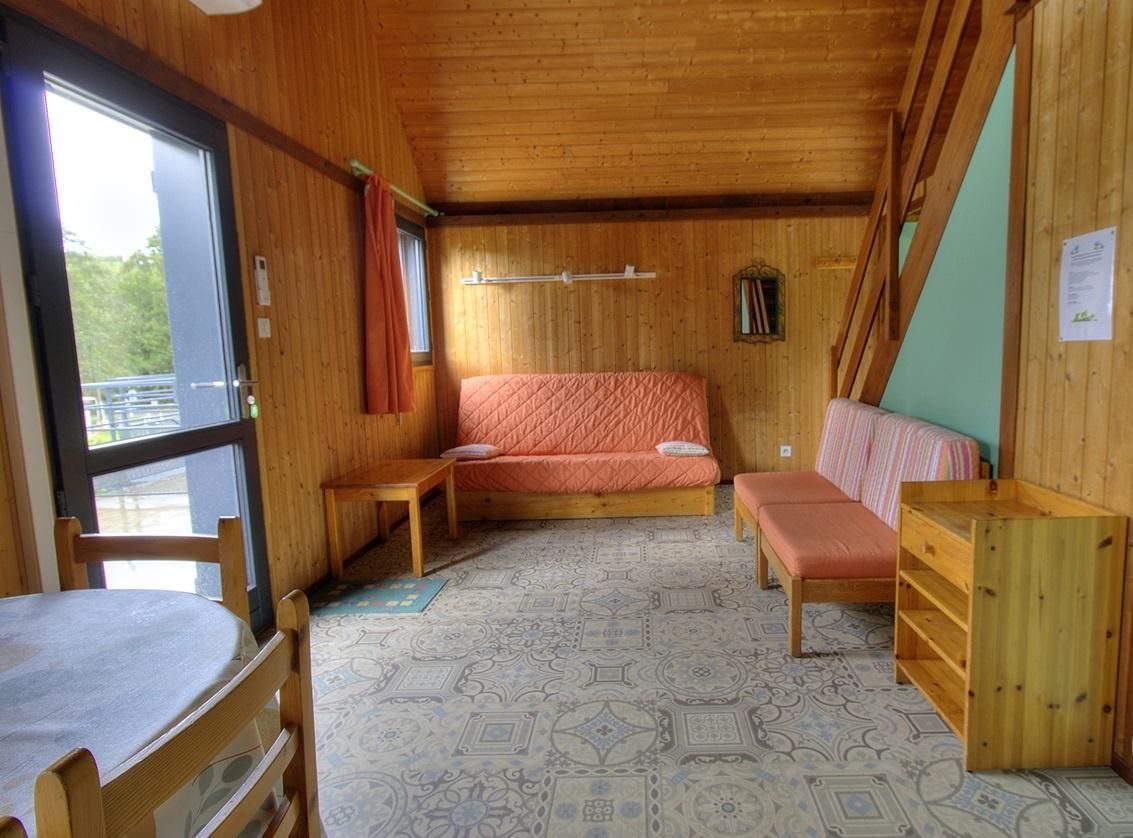 Chalet-gîte 'Epicea' à Trades/Deux Grosnes en Haut Beaujolais - Sud Mâconnais dans le Rhône : le coin salon.