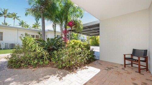 Beautifully renovated pet friendly unit with garden views and glimpses of the ocean!