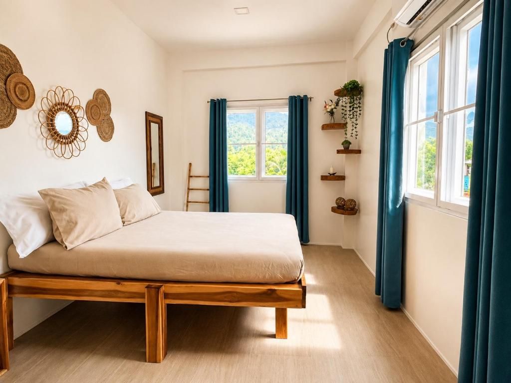 A bedroom with a wooden bed, a window with curtains, and wall decorations.